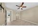 Bright bedroom with mirrored closet and tile floors at 18086 Clanton Ave, Port Charlotte, FL 33948