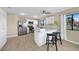 Modern kitchen with white cabinets, granite counters at 18086 Clanton Ave, Port Charlotte, FL 33948