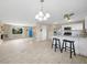 Open concept kitchen and dining area at 18086 Clanton Ave, Port Charlotte, FL 33948