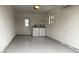 Bright laundry room with washer and dryer, and extra storage at 18086 Clanton Ave, Port Charlotte, FL 33948