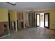 Open concept living room with access to patio at 201 Winson Ave, Englewood, FL 34223