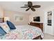 Bedroom with king-size bed and TV at 2341 W Marion Ave, Punta Gorda, FL 33950