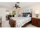 Bedroom with king-size bed and access to patio at 2341 W Marion Ave, Punta Gorda, FL 33950