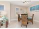 Small dining area with glass table and wicker chairs at 2341 W Marion Ave, Punta Gorda, FL 33950