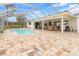 Large pool and patio area with screened enclosure at 2341 W Marion Ave, Punta Gorda, FL 33950