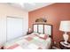 Bedroom with a double bed and an accent wall at 24667 Rio Villa Lakes Cir, Punta Gorda, FL 33950