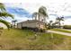 Single-Gathering home with a landscaped yard at 24667 Rio Villa Lakes Cir, Punta Gorda, FL 33950