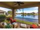 Relaxing screened porch overlooking a lake at 24667 Rio Villa Lakes Cir, Punta Gorda, FL 33950