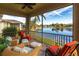 Relaxing screened porch overlooking a lake at 24667 Rio Villa Lakes Cir, Punta Gorda, FL 33950