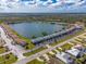 Aerial view of condo community by lake at 25225 Rampart Blvd # 1701, Punta Gorda, FL 33983