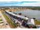 Aerial perspective showcasing the condo's lakefront location and parking at 25225 Rampart Blvd # 1701, Punta Gorda, FL 33983