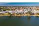 Aerial view showcasing building and lakefront location at 25225 Rampart Blvd # 1701, Punta Gorda, FL 33983