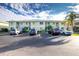 Front view of condo building with parking at 25225 Rampart Blvd # 1701, Punta Gorda, FL 33983