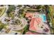 Aerial view of community pool, tennis courts, and clubhouse at 255 W End Dr # 3301, Punta Gorda, FL 33950