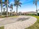 Community entrance with fountain and palm trees at 255 W End Dr # 3301, Punta Gorda, FL 33950