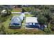 Aerial view of house, pool, and detached garage at 29350 Goodhue St, Punta Gorda, FL 33982