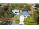 Aerial view of house, pool, and detached garage at 29350 Goodhue St, Punta Gorda, FL 33982