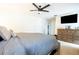 Spacious bedroom with a large dresser and TV at 29350 Goodhue St, Punta Gorda, FL 33982