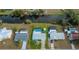 Bird's eye view of single-story home with pool and canal view at 3448 Middletown St, Port Charlotte, FL 33952