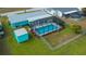 Aerial view showing home, pool, and canal at 3448 Middletown St, Port Charlotte, FL 33952