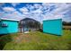 Large backyard with pool, shed, and canal views at 3448 Middletown St, Port Charlotte, FL 33952