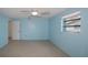 Light blue bedroom with tile flooring and ceiling fan at 3448 Middletown St, Port Charlotte, FL 33952