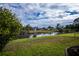 Peaceful backyard view of the canal at 3448 Middletown St, Port Charlotte, FL 33952