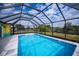 Inviting screened pool with a canal view at 3448 Middletown St, Port Charlotte, FL 33952