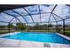 Inviting screened pool with a canal view at 3448 Middletown St, Port Charlotte, FL 33952