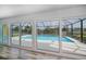 View of refreshing pool from sliding glass doors at 3448 Middletown St, Port Charlotte, FL 33952