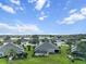 An aerial view of a residential community near a lake at 3717 Lakewood Blvd, North Port, FL 34287