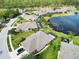 Aerial view of a house with pool and lush landscaping at 3717 Lakewood Blvd, North Port, FL 34287