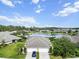 Aerial view of a house with a two-car garage and landscaped yard at 3717 Lakewood Blvd, North Port, FL 34287