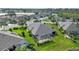 Aerial view of a house with a screened-in pool area at 3717 Lakewood Blvd, North Port, FL 34287