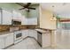 Spacious kitchen with stainless steel appliances and white cabinets at 3717 Lakewood Blvd, North Port, FL 34287