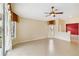 Bright living room featuring tile floors and large windows at 3717 Lakewood Blvd, North Port, FL 34287