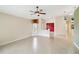 Open living area with tile floors and access to other rooms at 3717 Lakewood Blvd, North Port, FL 34287