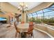 Breakfast nook with view of the pool and backyard at 3977 La Costa Island Ct, Punta Gorda, FL 33950