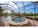 Private screened-in pool and spa at 3977 La Costa Island Ct, Punta Gorda, FL 33950