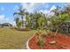 Beautifully landscaped backyard oasis at 420 Chamber Nw St, Port Charlotte, FL 33948