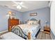 Serene bedroom with light walls and wood floors at 420 Chamber Nw St, Port Charlotte, FL 33948