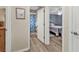 Hallway with bedroom and bathroom access at 420 Chamber Nw St, Port Charlotte, FL 33948