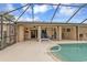 Enjoyable pool area with a screened enclosure at 420 Chamber Nw St, Port Charlotte, FL 33948