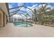 Inviting screened pool with ample space for lounging at 420 Chamber Nw St, Port Charlotte, FL 33948