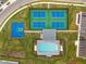 Community pickleball and basketball courts near pool at 44259 Saddlewood Ct, Punta Gorda, FL 33982