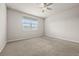 Spacious bedroom with neutral walls and ceiling fan at 44259 Saddlewood Ct, Punta Gorda, FL 33982