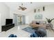 Living room with sliding glass doors leading to backyard at 4522 Mckay St, North Port, FL 34286