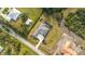 Property's aerial view showcasing home, landscaping, and surrounding area at 500 Woodstork Ln, Punta Gorda, FL 33982