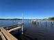 Private wooden dock with access to the calm waters at 500 Woodstork Ln, Punta Gorda, FL 33982