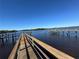 Expansive wooden dock offering serene waterfront views at 500 Woodstork Ln, Punta Gorda, FL 33982